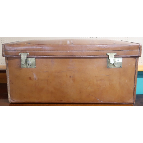 62 - A 19th century leather travel trunk/footlocker with brass locks and twin leather carry handles,38cm ... 