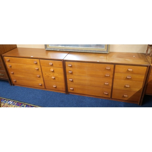 75 - A lot of two mid 20th century teak banks of drawers each with four long alongside four short drawers... 