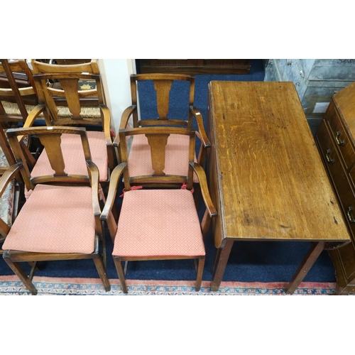 77 - A lot comprising a 20th century oak drop end dining table and four accompanying dining carvers (5)