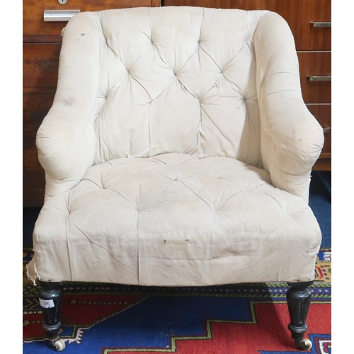 82 - A 19th century button back upholstered armchair in the manner of Howard and Sons with shaped back an... 