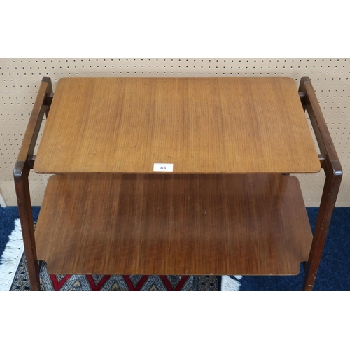 85 - A mid 20th century Wrighton two tier side table with lift out tray top on shaped tapering supports j... 