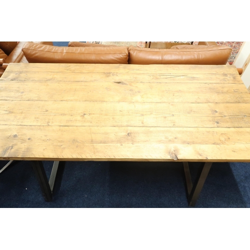 86 - A 20th century industrial style table with four plank top on metallic base, 76cm high x 180cm long x... 