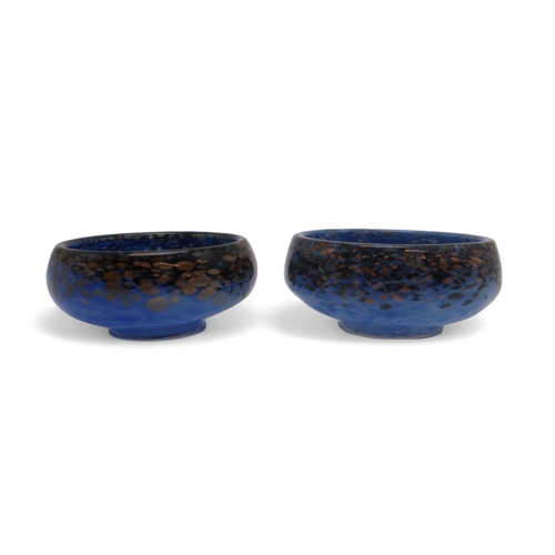 202 - Two Monart dishes both in mottled blue with black and aventurine to the rims, 10cm diameter