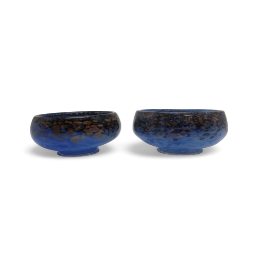 202 - Two Monart dishes both in mottled blue with black and aventurine to the rims, 10cm diameter