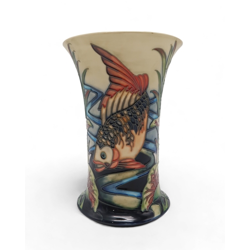 205 - A Moorcroft Derwent pattern vase, designed by Philip Gibson, with tube lined fish and water lilies, ... 