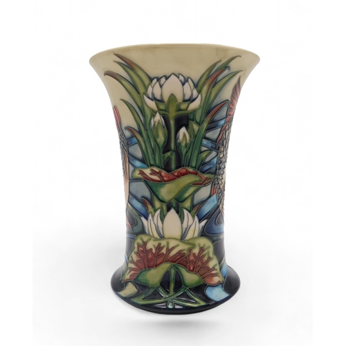 205 - A Moorcroft Derwent pattern vase, designed by Philip Gibson, with tube lined fish and water lilies, ... 