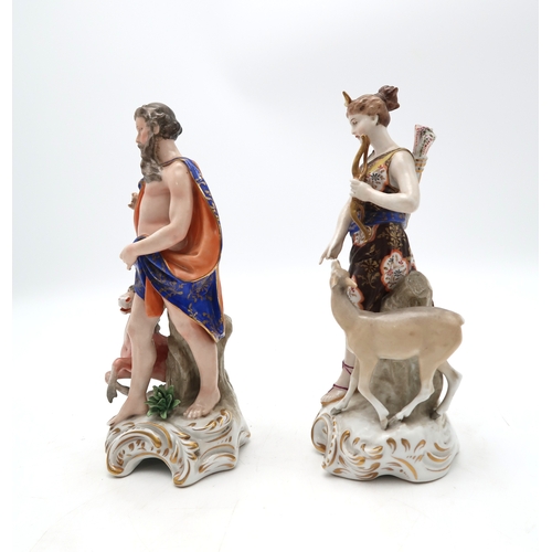 213 - A pair of porcelain allegorical figures modelled as Neptune and Diana, he with a merhorse and she wi... 