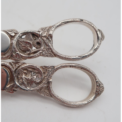 362 - A pair of Edwardian silver grape scissors, Birmingham 1903, maker's mark rubbed (possibly GS), with ... 