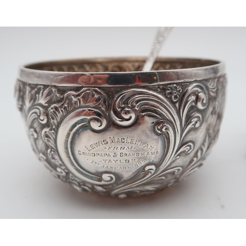 364 - A Victorian silver sugar bowl and spoon, by Martin Hall & Co, the bowl London 1890, the spoon Gl... 