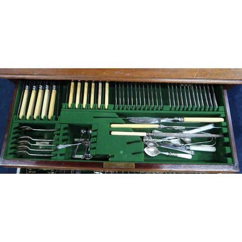 390 - A two drawer canteen of stainless steel ivorine handled cutlery, with assorted loose cutlery, fish s... 