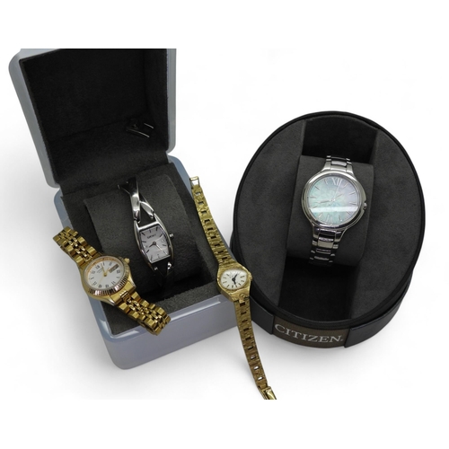 897A - A Citizen Eco Drive ladies watch with a patterned mother of pearl dial, a DKNY bangle watch also wit... 