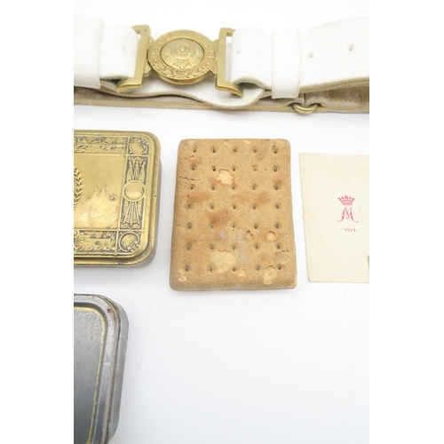 528 - A WW1 Princess Mary Christmas 1914 tin, a period hardtack biscuit; together with a King's Own Scotti... 