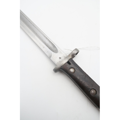 541 - A French Model 1866 Chassepot bayonet, dated 1871 to spine, the blade measuring approx. 57cm in leng... 