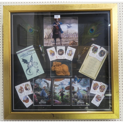 555 - A framed display commemorating the 2004 film Finding Neverland, featuring a photograph signed by cas... 