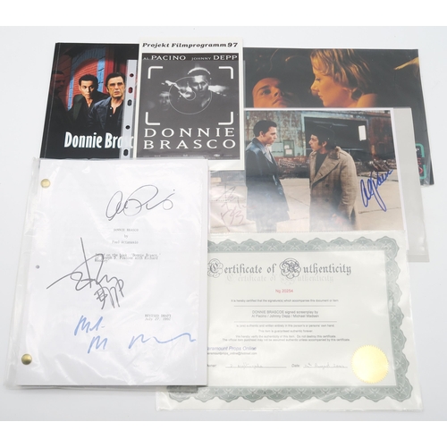 559 - Johnny Depp - a collection of photographs and other publicity material, much bearing signatures and ... 