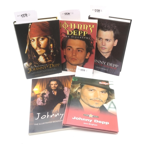 559 - Johnny Depp - a collection of photographs and other publicity material, much bearing signatures and ... 