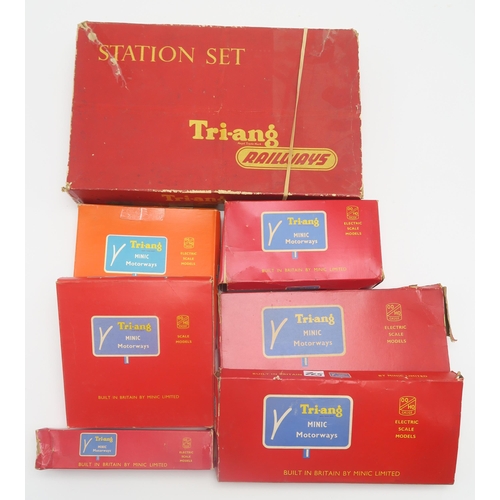 572 - A collection of Tri-ang Minic Motor Racing boxed sets, cars and additional track