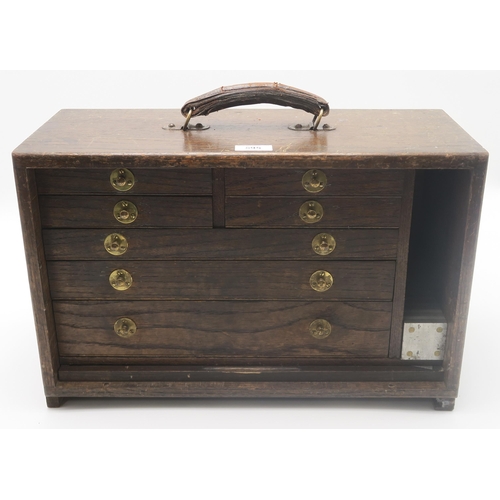 595 - A well-made oak tool chest, containing a large selection of precision engineer's tools, including va... 