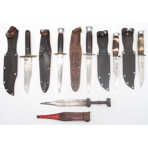 599 - A collection of hunting-style knifes, to include to include two 