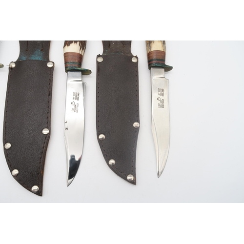 599 - A collection of hunting-style knifes, to include to include two 