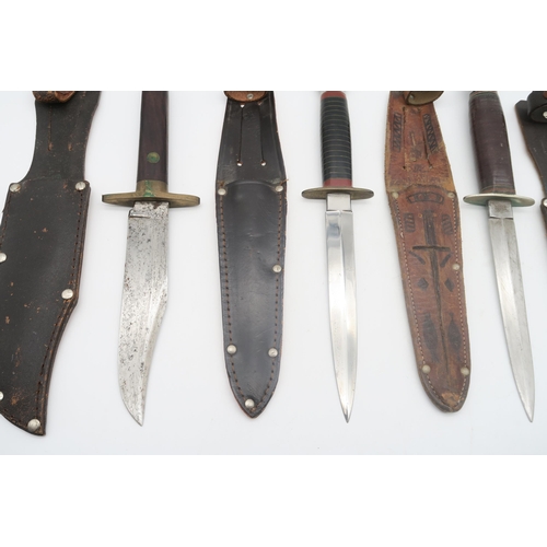 599 - A collection of hunting-style knifes, to include to include two 