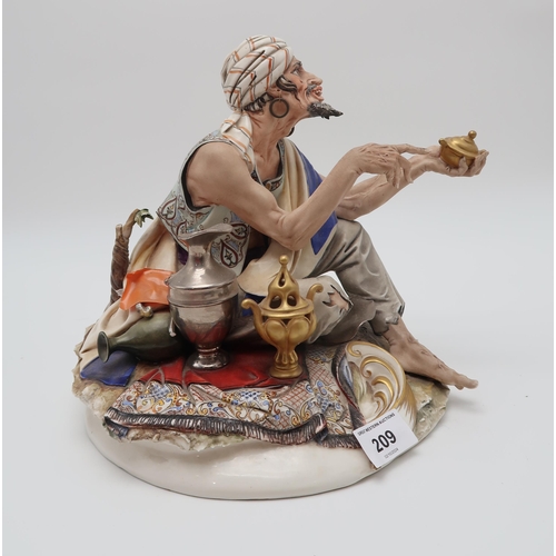 209 - A Capodimonte porcelain figure of a Turkish man, sat on a carpet selling wares