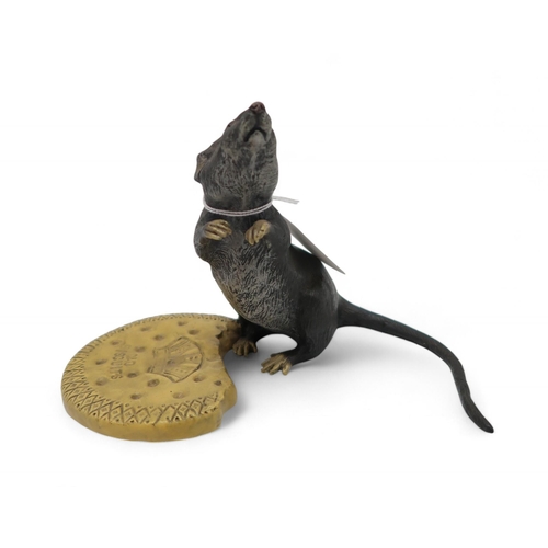 214 - A 20th century after Bergman cold painted bronze figurine of a rat with biscuit, the base stamped 'B... 