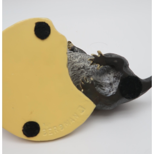 214 - A 20th century after Bergman cold painted bronze figurine of a rat with biscuit, the base stamped 'B... 