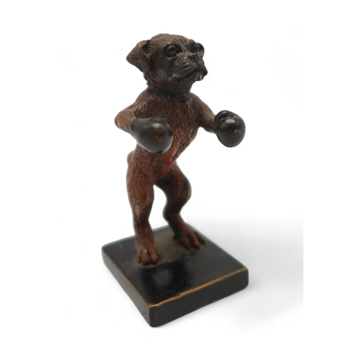 215 - A 20th century after Bergman cold painted bronze figurine of a Boxer dog wearing boxing gloves, stam... 