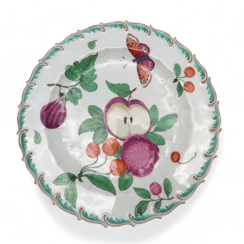 223 - A Chelsea porcelain botanical plate, painted with fruits and a butterfly