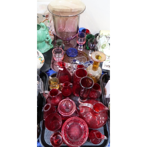 280 - A collection of coloured glass including ruby jugs with clear glass handles etc