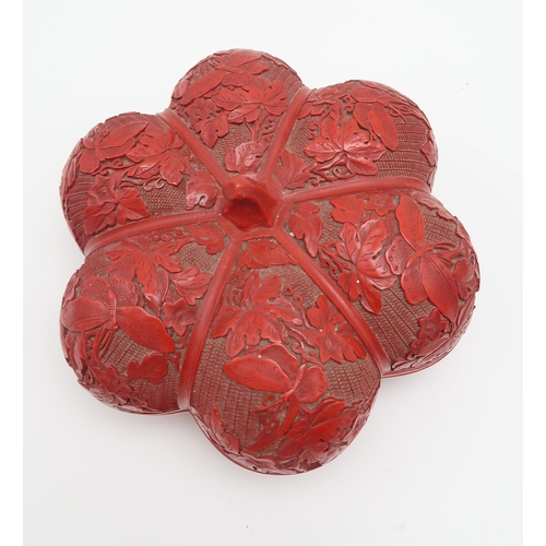 337 - A Chinese cinnabar melon-shaped lacquer box and cover, another rectangular example, a Japanese balus... 