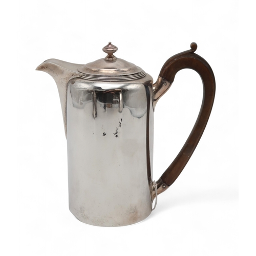 2519 - A GEORGE III SILVER HOT WATER POTby Robert Garrard I, London 1806, of plain cylindrical form, with a... 