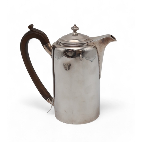 2519 - A GEORGE III SILVER HOT WATER POTby Robert Garrard I, London 1806, of plain cylindrical form, with a... 