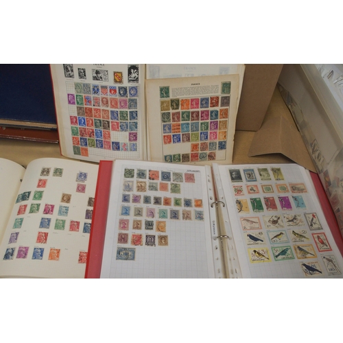 477 - A worldwide stamp collection in stock books and albums with many thousands of loose stamps mostly us... 