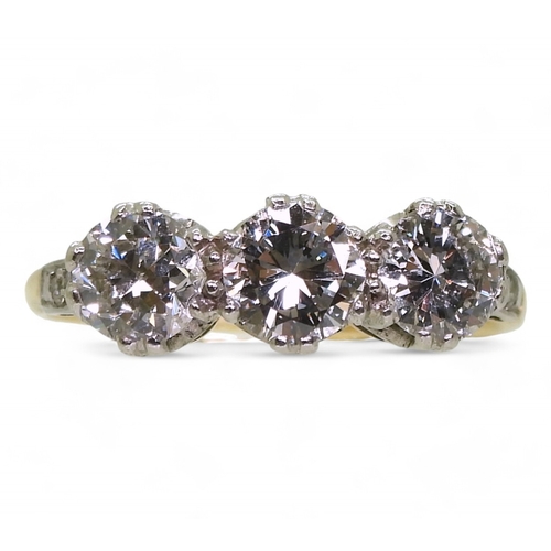 2701 - A THREE STONE DIAMOND RINGset with estimated approx 1.50cts of brilliant cut diamonds, with further ... 