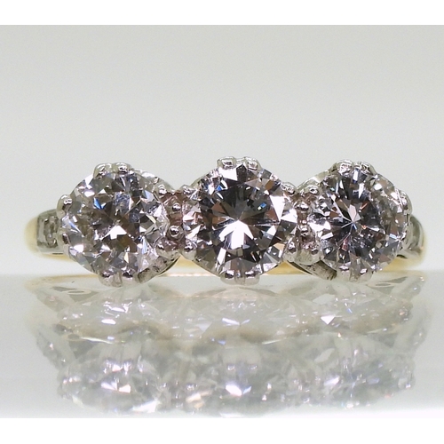 2701 - A THREE STONE DIAMOND RINGset with estimated approx 1.50cts of brilliant cut diamonds, with further ... 