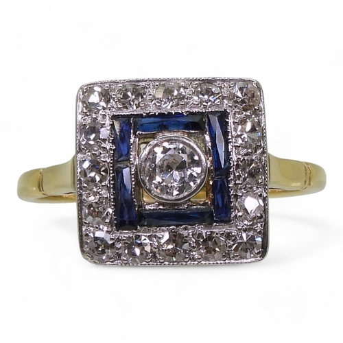 2702 - AN ART DECO RINGthe 18ct gold and platinum mount is set with eight and brilliant cut diamonds , with... 