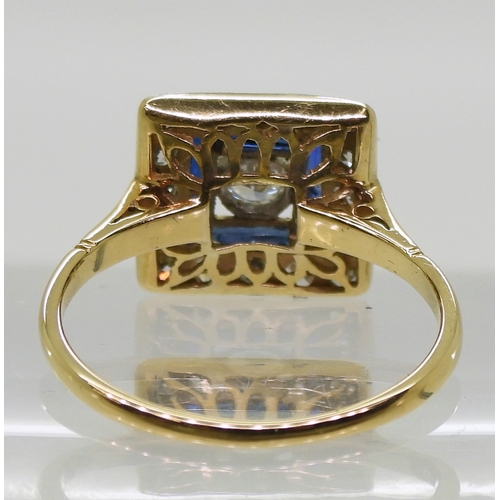 2702 - AN ART DECO RINGthe 18ct gold and platinum mount is set with eight and brilliant cut diamonds , with... 