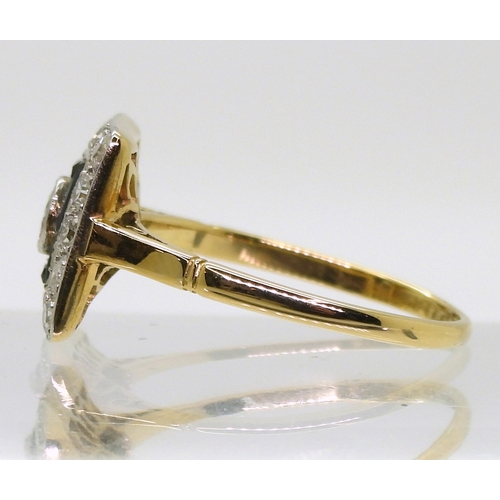 2702 - AN ART DECO RINGthe 18ct gold and platinum mount is set with eight and brilliant cut diamonds , with... 