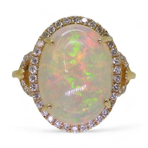 2703 - AN OPAL AND DIAMOND RINGfrom the Illiana premier collection of GemsTV. Set with a substantial caboch... 