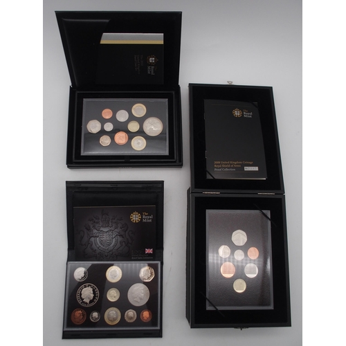 449 - Royal Mint A collection of proof coin sets with De Luxe, Royal Shield Of Arms sets and The Year 2000... 