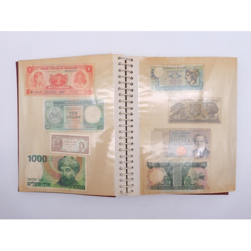 456 - An album of worldwide banknotes