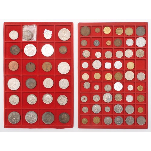 453 - A worldwide coin collection in nine display trays