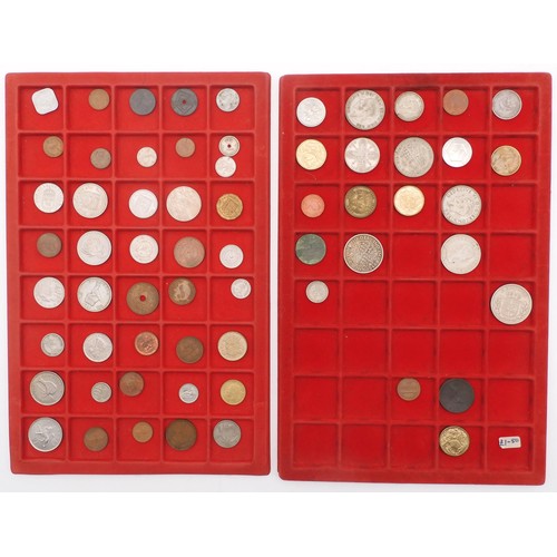 453 - A worldwide coin collection in nine display trays