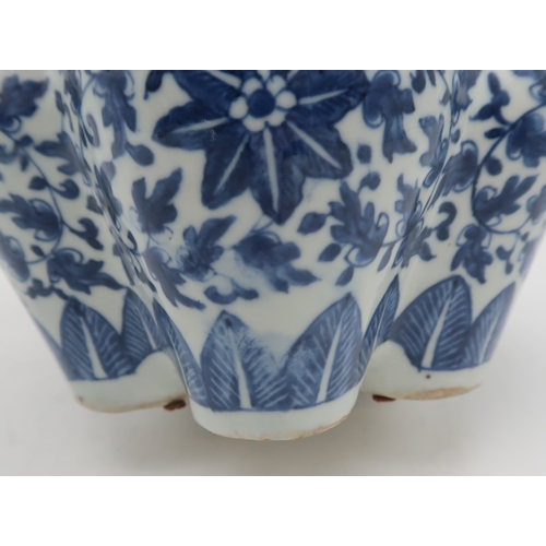 2404 - A CHINESE BLUE AND WHITE BULB VASE Painted with peonies and scrolling foliage, 25cm high... 