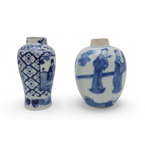 2406 - A CHINESE BLUE AND WHITE JAR Painted with figures in a garden with plantain, blue four character mar... 