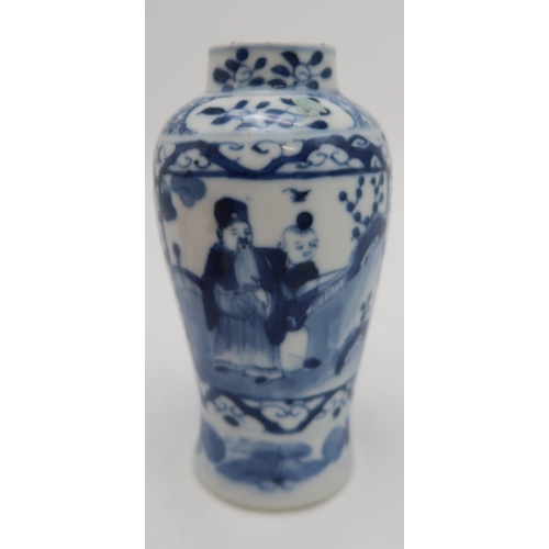 2406 - A CHINESE BLUE AND WHITE JAR Painted with figures in a garden with plantain, blue four character mar... 