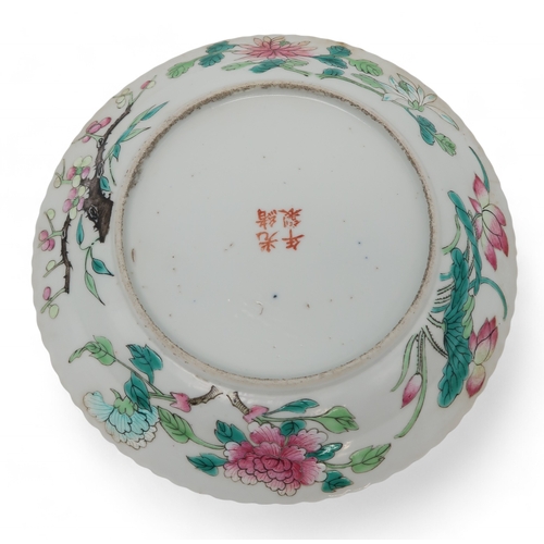 2407 - A CHINESE CELADON GROUND JARPainted with rockwork and foliage, 18cm high, Canton saucer 15cm diamete... 