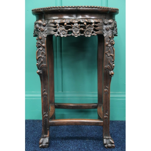 2008 - A 19TH CENTURY CHINESE HARDWOOD MARBLE TOPPED JARDINIERE STAND with shaped top over pierced carved f... 